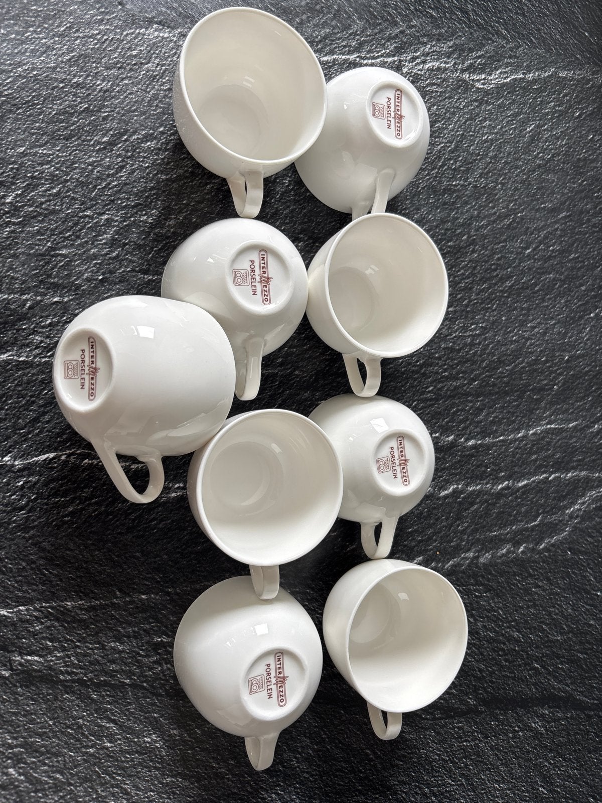 Intermezzo porselein koffie mokken - set van 9, Ophalen of Verzenden, Zo goed als nieuw, Effen, Kop(pen) en/of Schotel(s)