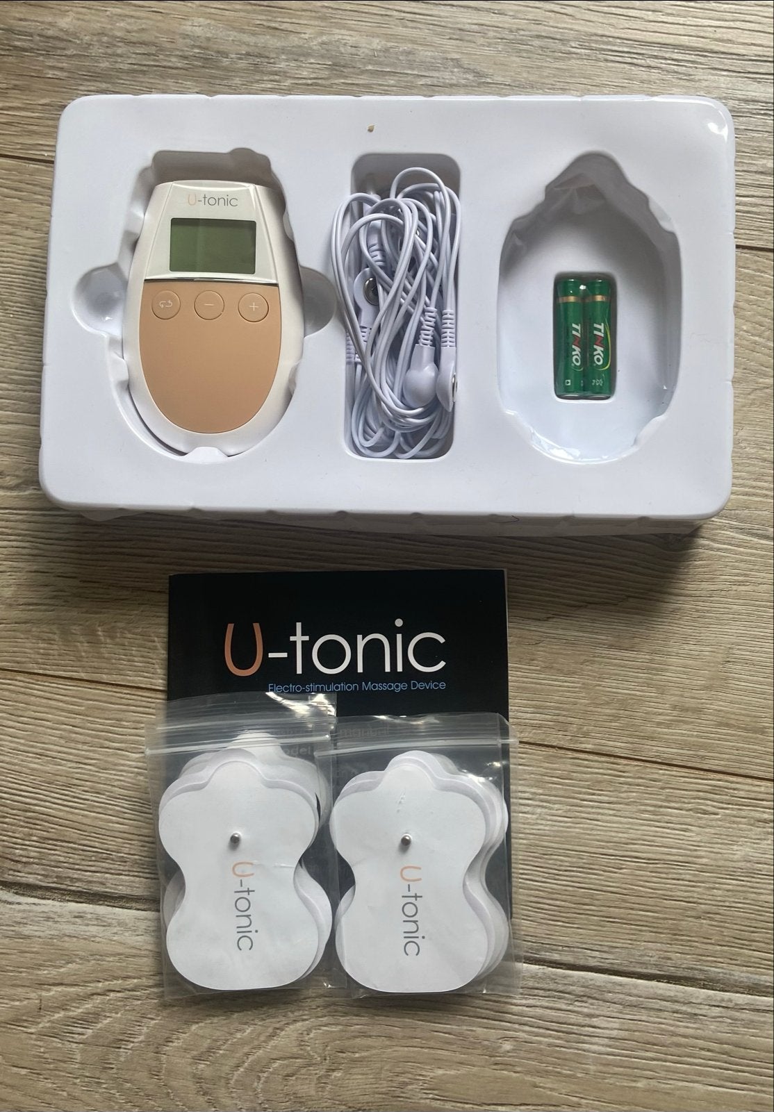 Nieuw U-tonic Electro-stimulatie Massage Apparaat, Ophalen of Verzenden, Nieuw, Apparaat
