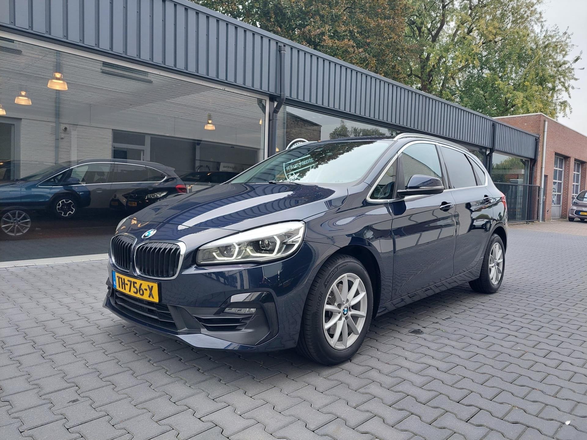 BMW 2-serie Active Tourer 218i 84.000KM Clima inclusief Gara, Auto's, Stof, Gebruikt, Met garantie (alle), Blauw