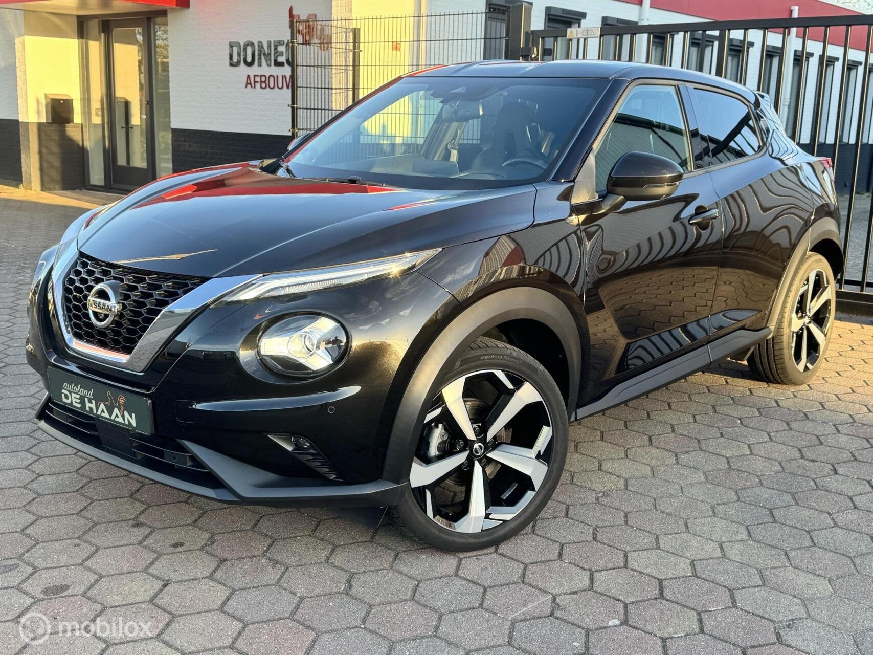 Nissan Juke 1.0 DIG-T Tekna BOSE UITVOERING FULL OPTIONS, Voorwielaandrijving, Leder en Stof, Zwart, Origineel Nederlands