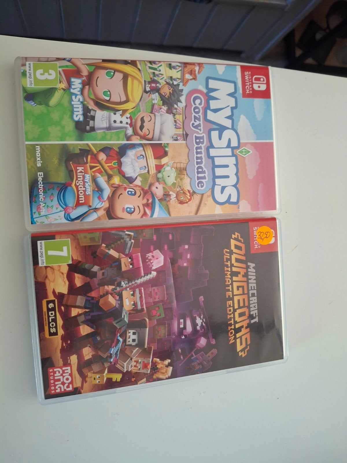 Nintendo Switch games:My Sims Cozy Bundle & Minecraft Dungeo, 1 speler, Ophalen of Verzenden, Zo goed als nieuw, Vanaf 7 jaar