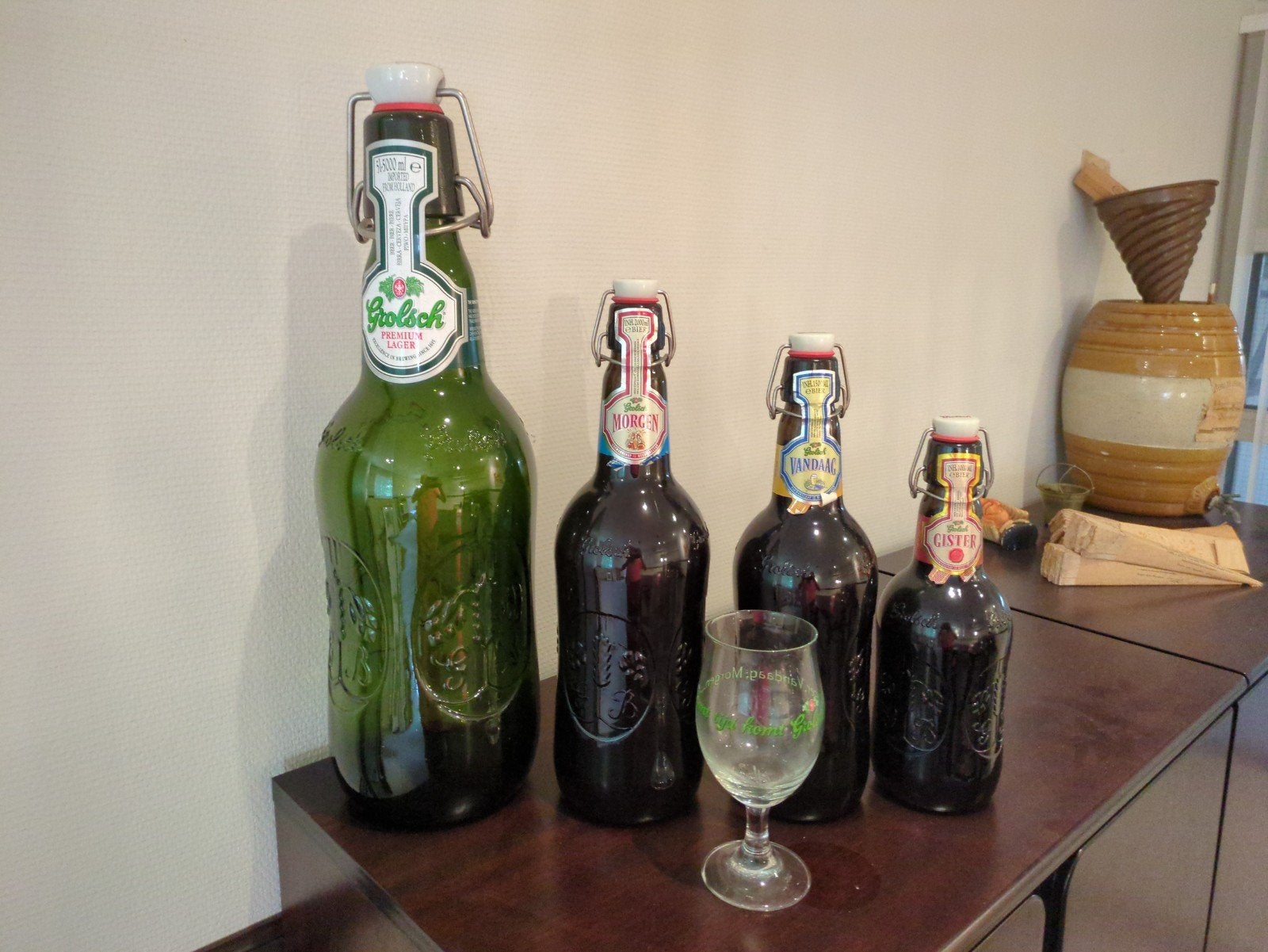 Grolsch beugel en diverse speciaalbierflessen met glas, Ophalen of Verzenden, Zo goed als nieuw, Grolsch