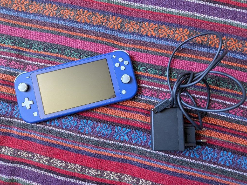 Nintendo Switch Lite blauw, Ophalen of Verzenden, Overige kleuren, Zo goed als nieuw