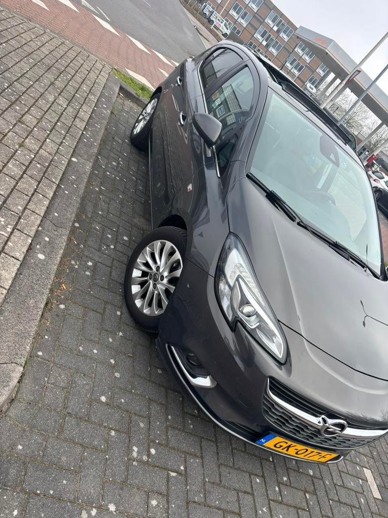 Opel Corsa 1.0T 85KW/115PK 5D 2015 Grijs, Voorwielaandrijving, Zwart, Lichtsensor, Alcantara