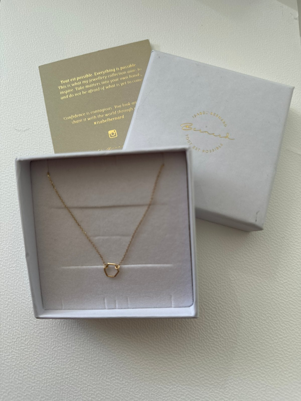 Gouden ketting/collier met hexagon hanger, Ophalen of Verzenden, Zo goed als nieuw, Goud, Met hanger