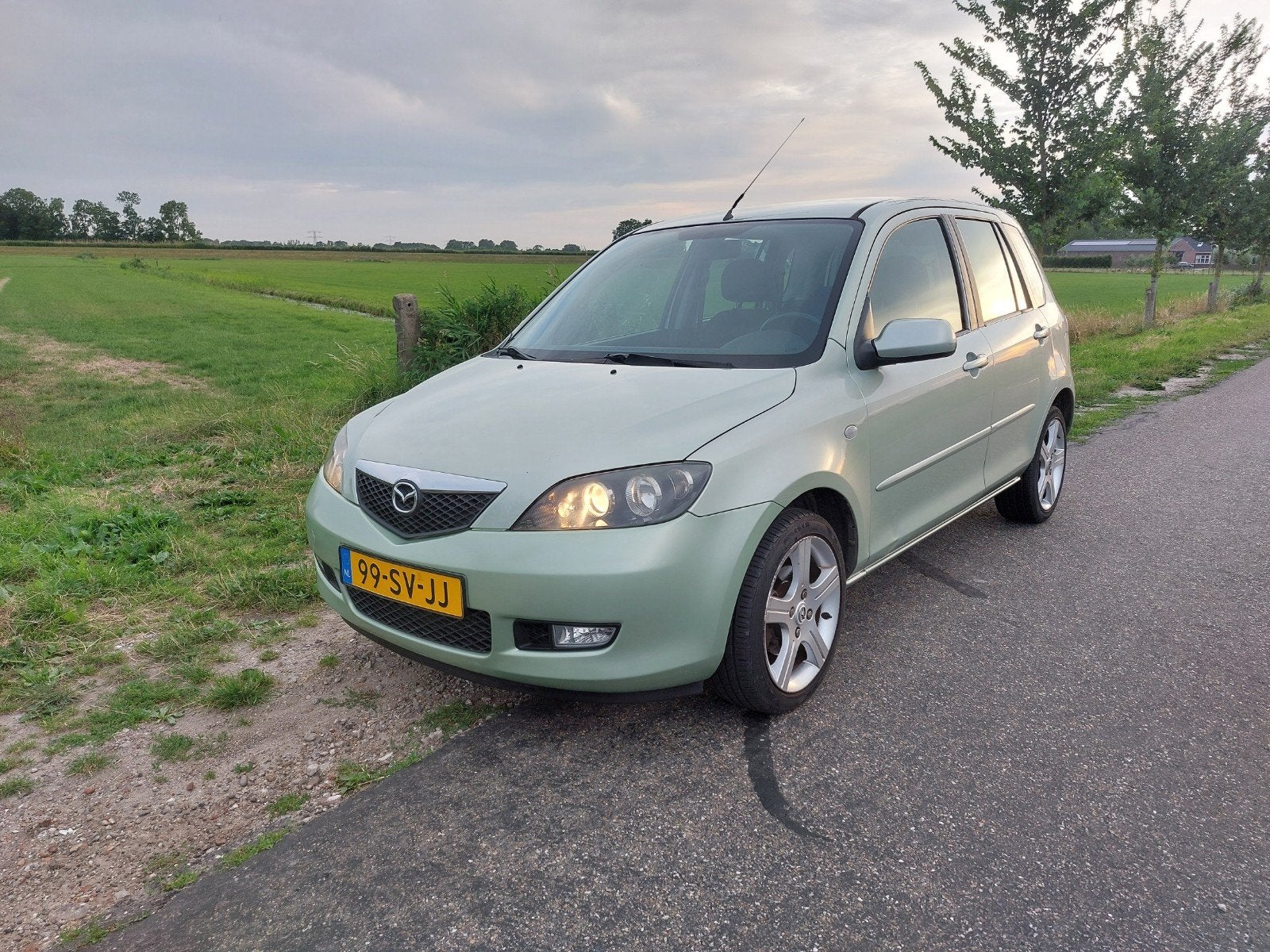 Mazda 2 1.4 16V Bouwjaar 2006, Auto's, Mazda, Voorwielaandrijving, 1025 kg, Zwart, 4 cilinders