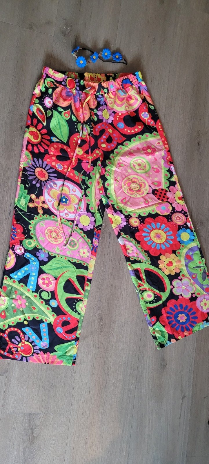 Hippie kostuum met bloemen hoofdband, Maat 42/44 (L), Nieuw, Ophalen of Verzenden, Kleding