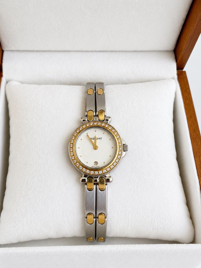 Pequignet Moorea dameshorloge met diamanten lunette, Sieraden, Tassen en Uiterlijk, Horloges | Dames, Overige merken, Staal, Polshorloge