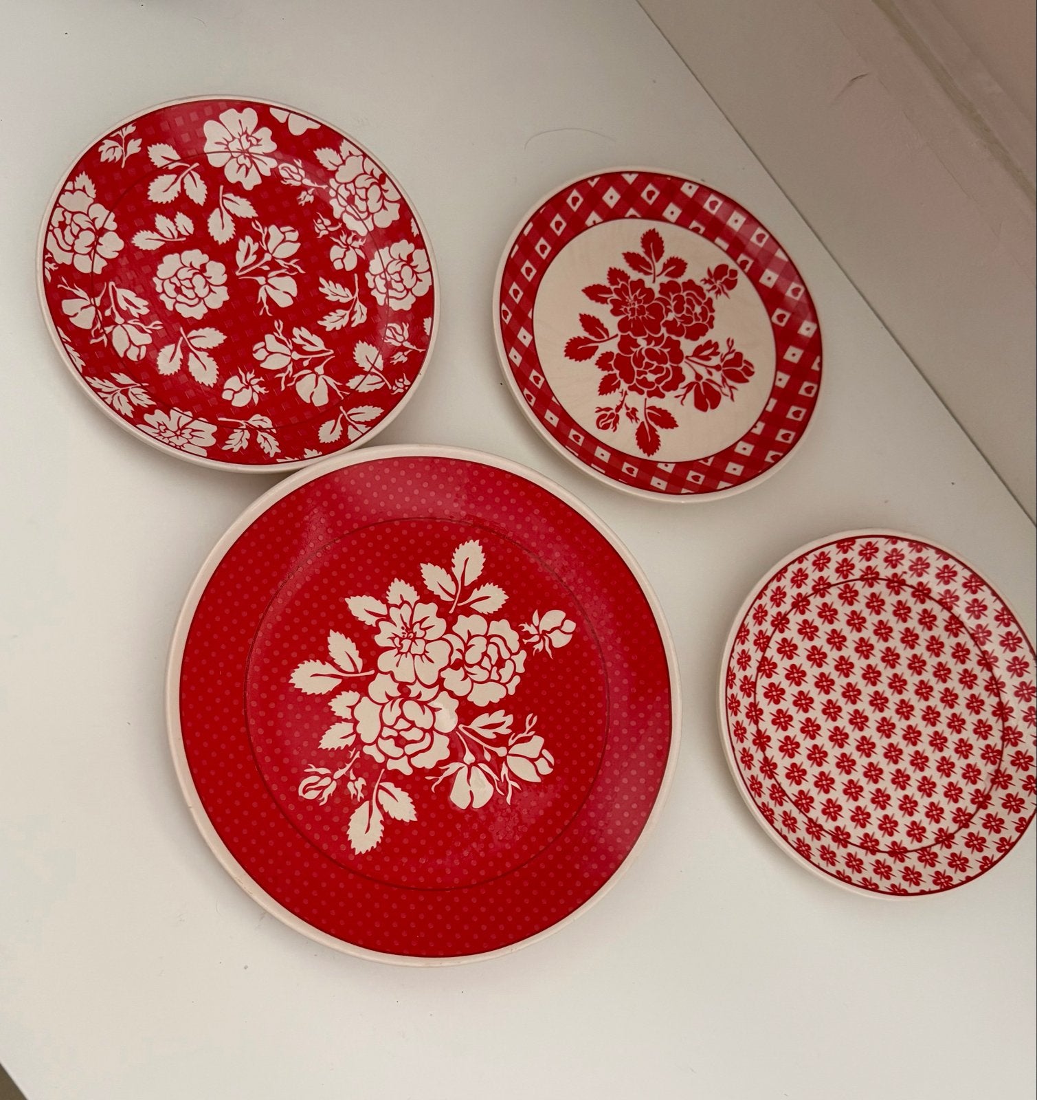 Set van 4 decoratieve borden met bloemmotief, Antiek en Kunst, Ophalen of Verzenden