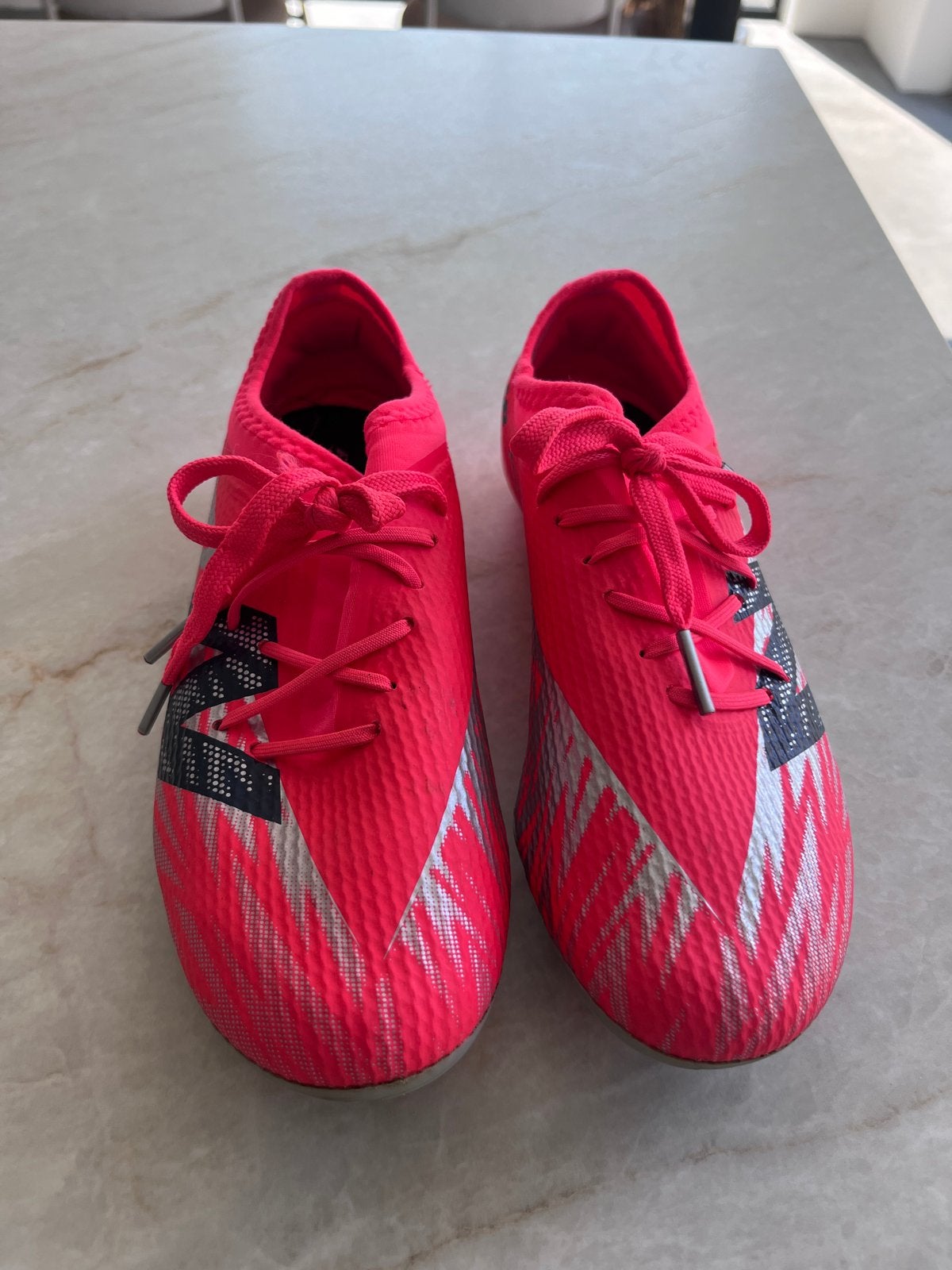 New Balance Furon V6 Dispatch FG voetbalschoenen roze/rood, Ophalen of Verzenden, Zo goed als nieuw, Schoenen