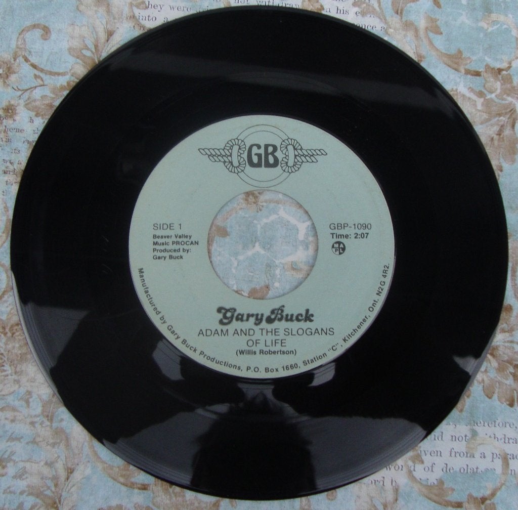 Gary Buck - Adam and the Slogans of Life (7 inch single), Gebruikt, 7 inch, Ophalen of Verzenden, Beschermende buitenhoes