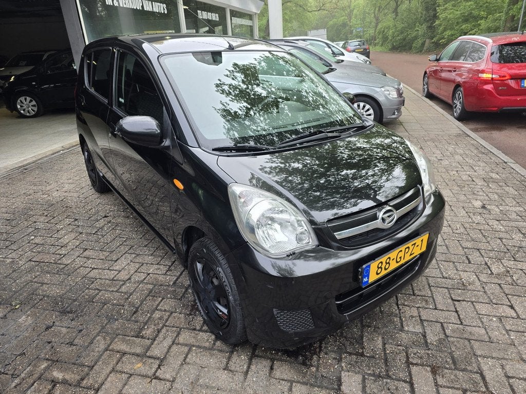 Daihatsu Cuore 1.0 Premium | 1E EIGENAAR | 12MND GARANTIE |, Voorwielaandrijving, Stof, 18 €/maand, 4 stoelen