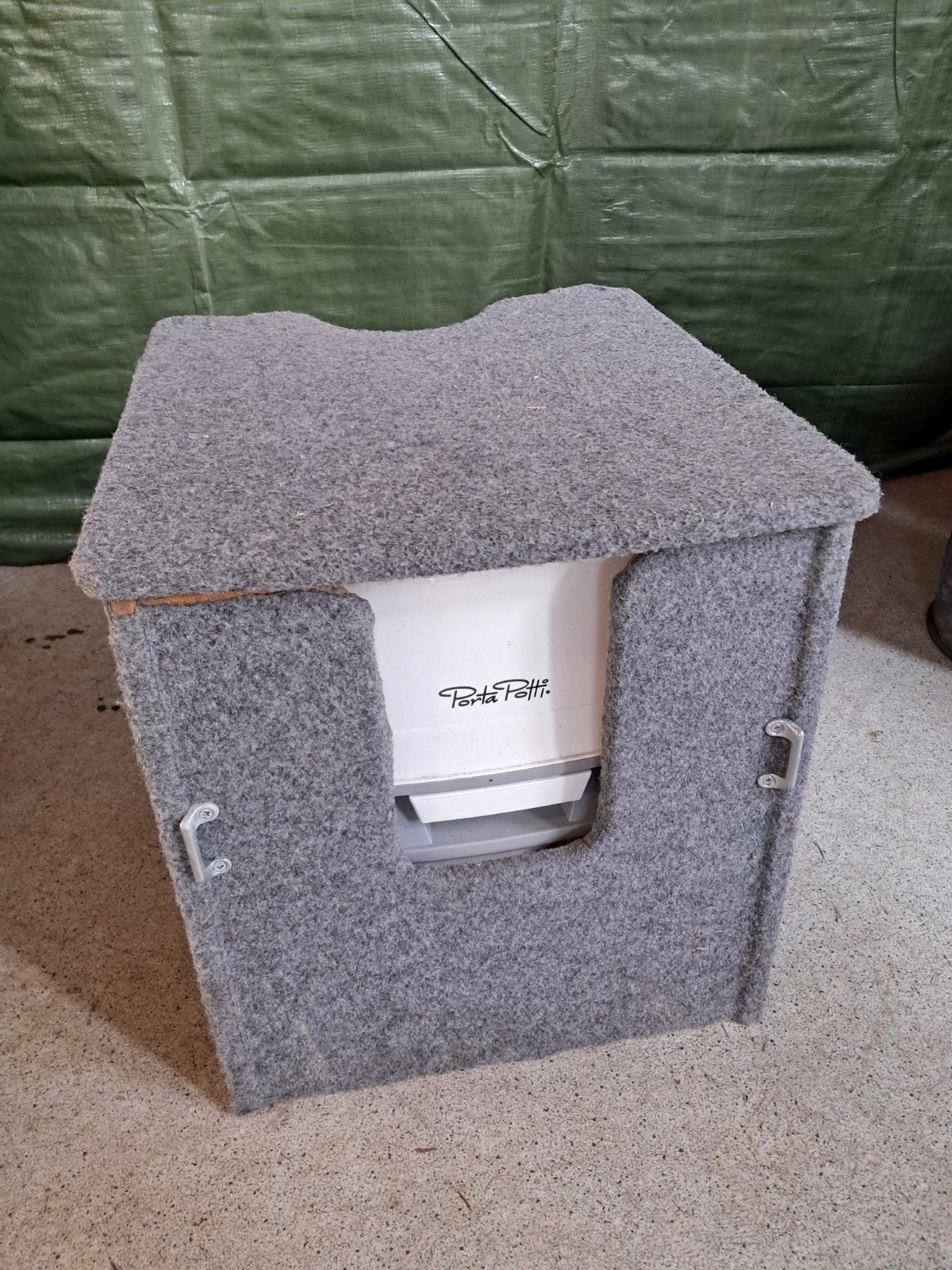 Porta Potti in zelfgemaakte ombouw, Ophalen