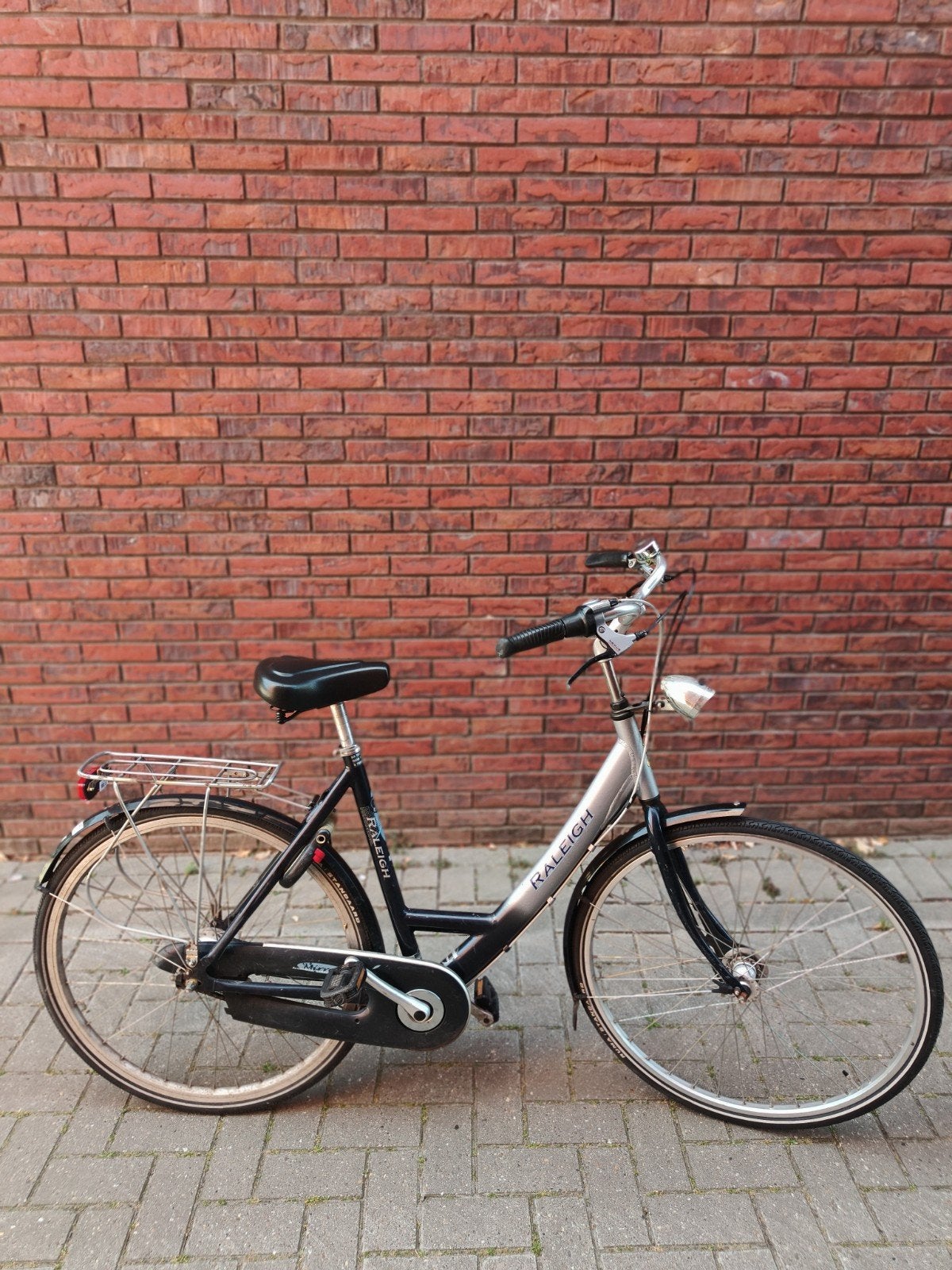 stadsfiets met 7 versnellingen en verlichting, Versnellingen, Trommelrem, Ophalen, Overige merken