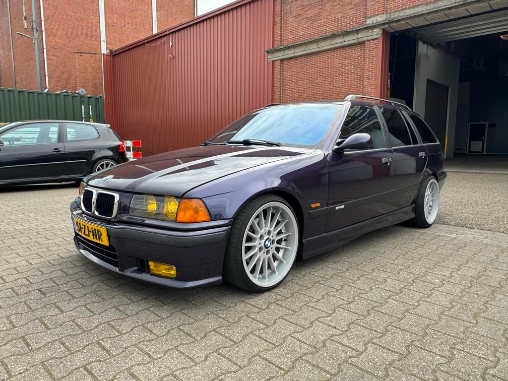 BMW 3-Serie 2.5 I 323 Touring AUT 1996 paars, Automaat, Achterwielaandrijving, Zwart, Leder