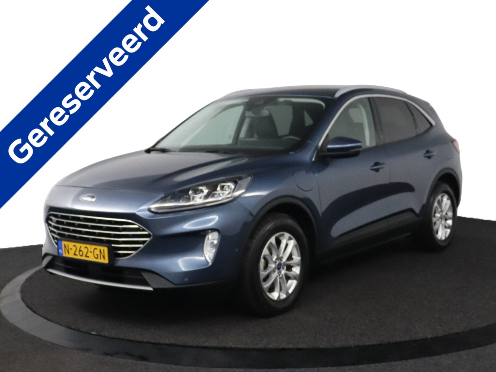 Ford Kuga 2.5 PHEV Titanium X | Trekhaak | Stoelverwarming |, Auto's, Gebruikt, 4 cilinders, Blauw, Leder en Stof