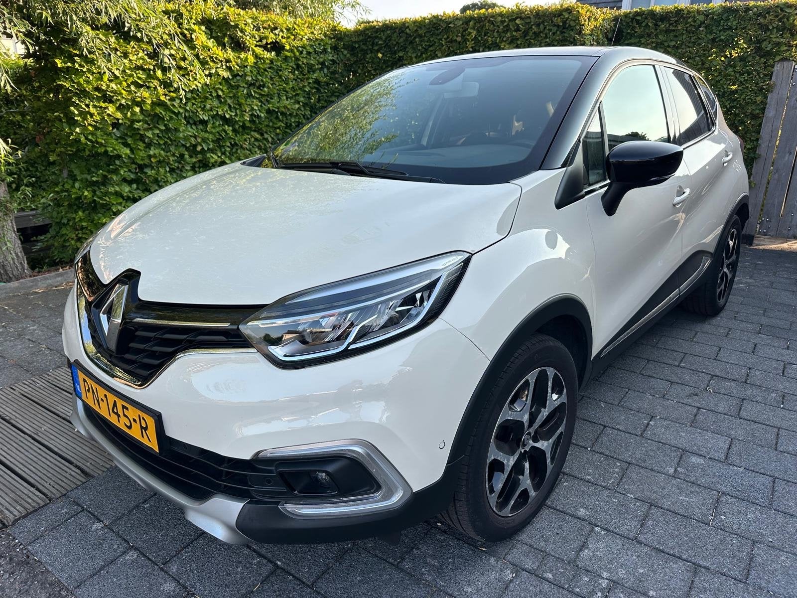 Renault Captur 1.2 TCE 120 2017 Wit met set winterbanden!, Voorwielaandrijving, Stof, 4 cilinders, 635 kg