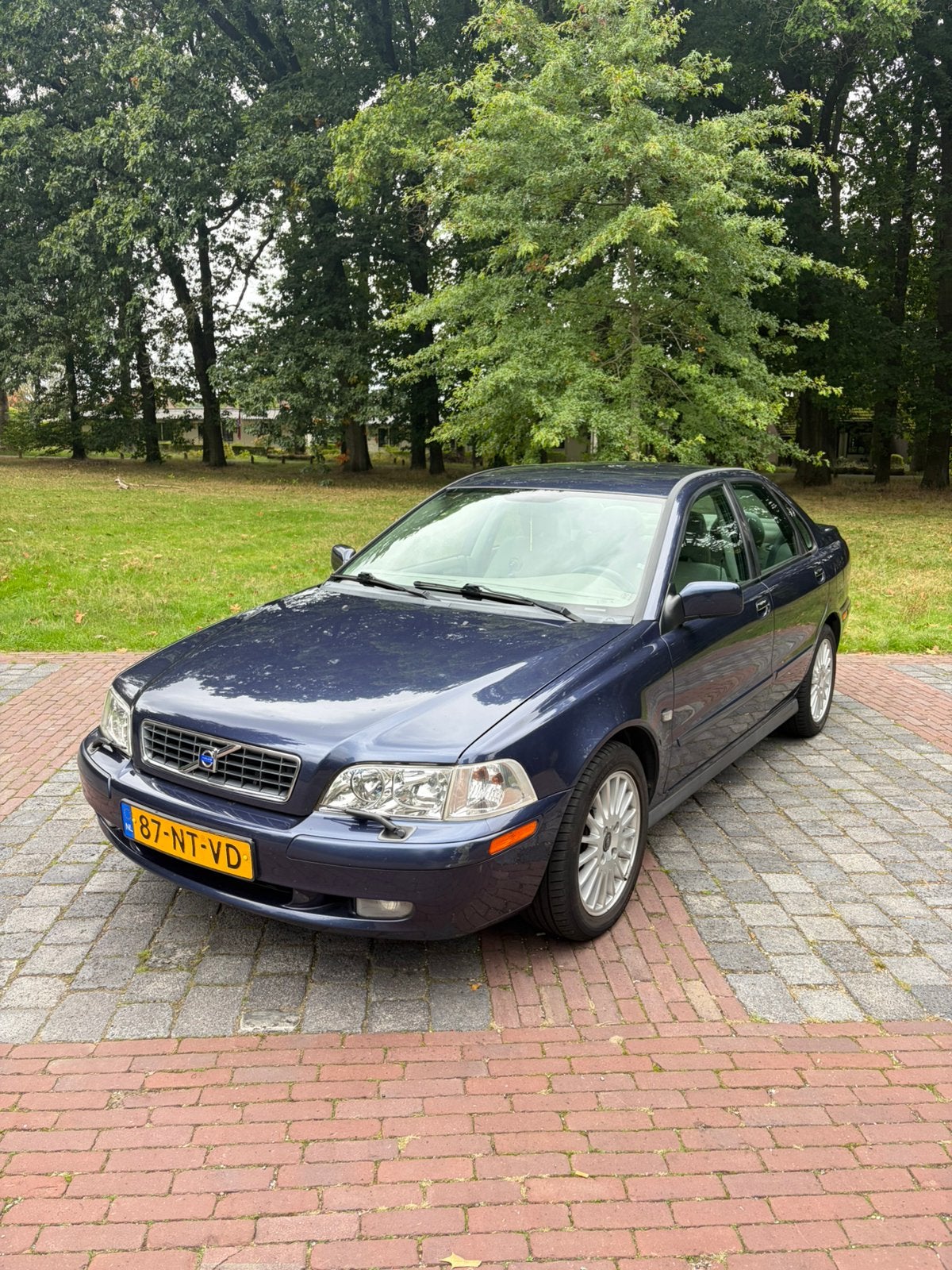 Volvo S40 1.8 2004 Blauw, Auto's, Stoelverwarming, Beige, 4 cilinders, Blauw