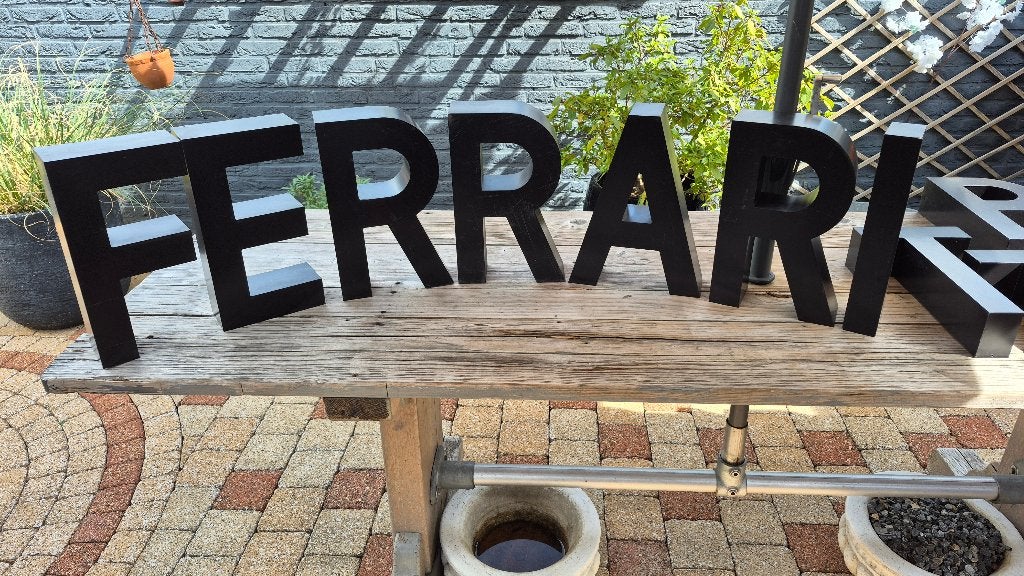 Oude reklame letters.oa.(FERRARI), Ophalen of Verzenden, Gebruikt, Reclamebord