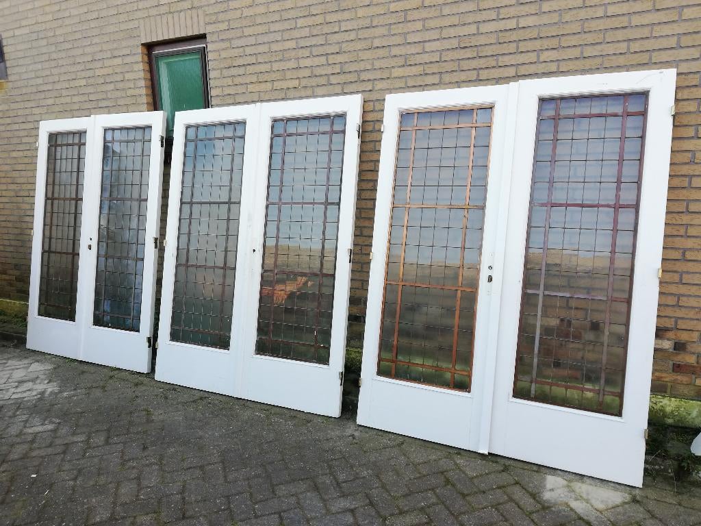 Drie sets dubbele deuren glas in koper 209hx 152/161,5/157br