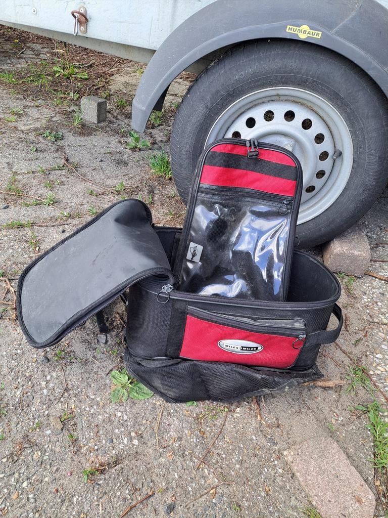 Tank tas motor, Ophalen