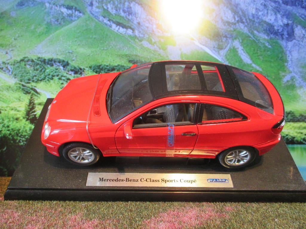 1/18 Mercedes Benz CL203 C-Klasse Coupé Welly rood, Hobby en Vrije tijd, Modelauto's | 1:18, Ophalen of Verzenden, Nieuw, Maisto