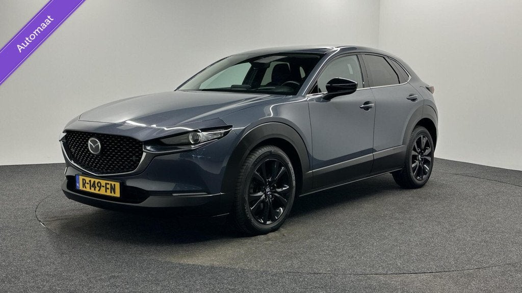 Mazda CX-30 2.0 e-SkyActiv-X M Hybrid Homura NAVI CAMERA ECC, Auto's, Voorwielaandrijving, 1998 cc, Stof, Gebruikt