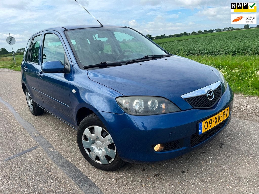 Mazda 2 1.4 Touring / automaat - 140.000km nap, Auto's, Gebruikt, 4 cilinders, Blauw, Origineel Nederlands