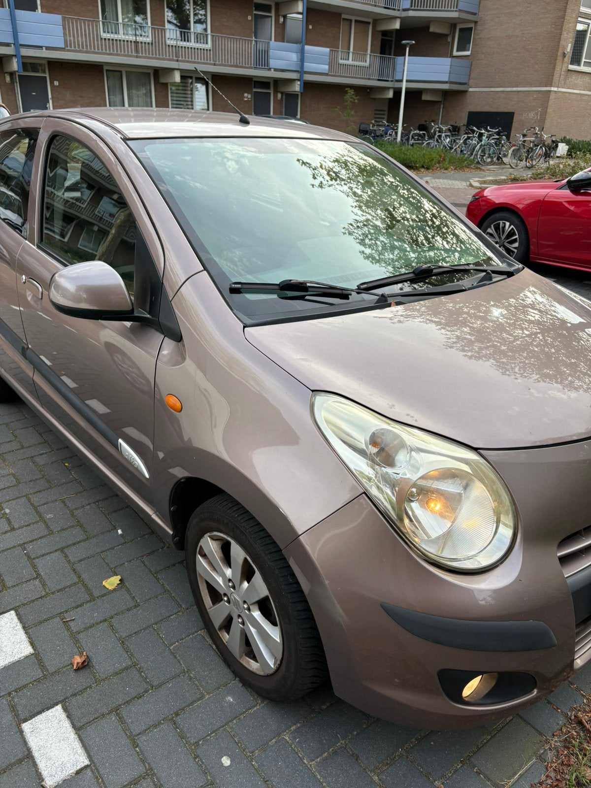 Suzuki Alto 1.0 2011 Bruin, Auto's, Voorwielaandrijving, Stof, 200 kg, Bruin