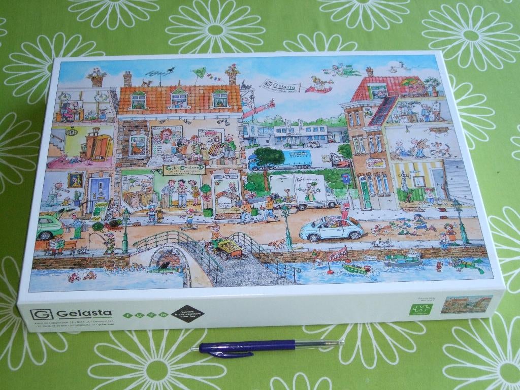 Cartoon puzzel van Gelasta - groothandel in vloerbedekking, Ophalen of Verzenden, 500 t/m 1500 stukjes, Nieuw, Legpuzzel