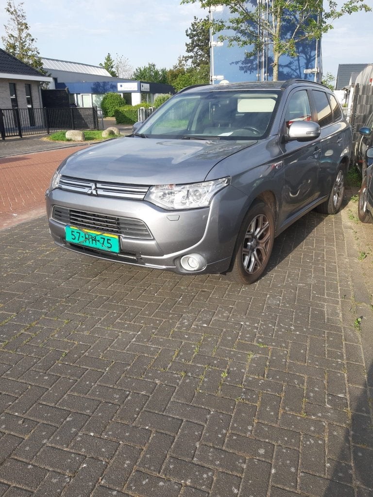 Mitsubishi Outlander 2.0 Dohc Mivec Phev 203pk 4WD CVT 5P, Outlander, 4 cilinders, Leder en Stof, Bedrijf