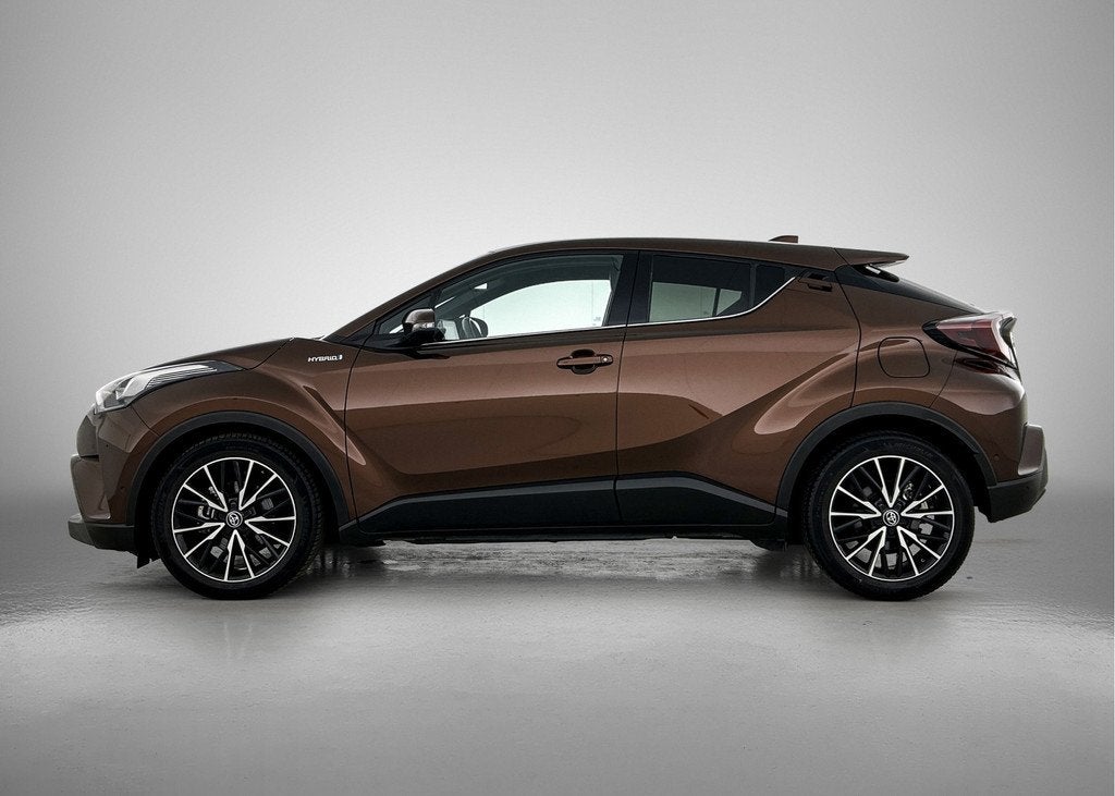 Toyota C-HR 1.8 Hybrid Premium | Dealer onderhouden | JBL |, Auto's, 12 maanden, 4 cilinders, 122 pk, Leder