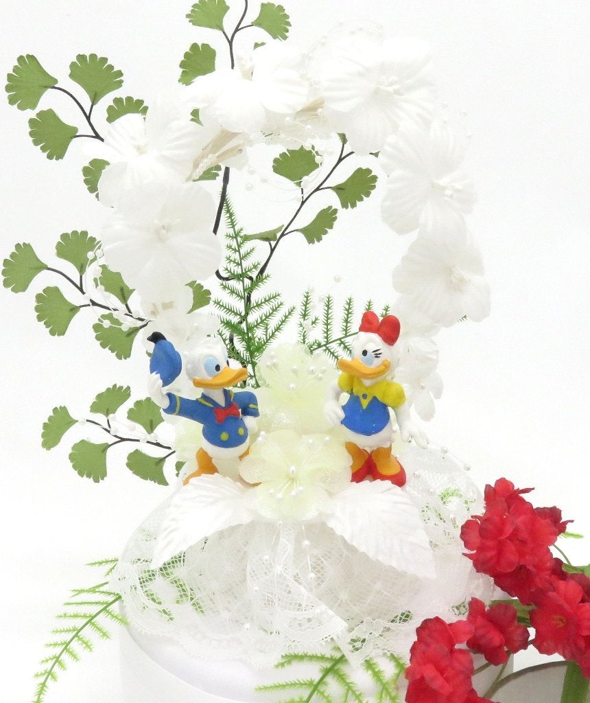 Prachtige Donald en Katrien Disney taart topper., Hobby en Vrije tijd, Feestartikelen, Ophalen of Verzenden, Nieuw, Versiering