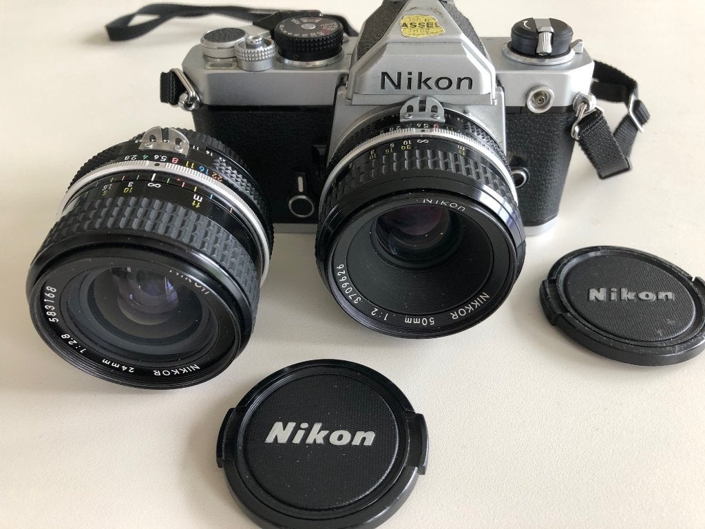 Nikon FM met Nikkor Ai 50mm 2.0 en Nikkor Ai 24mm 2.8, Ophalen, Gebruikt, Spiegelreflex, Nikon