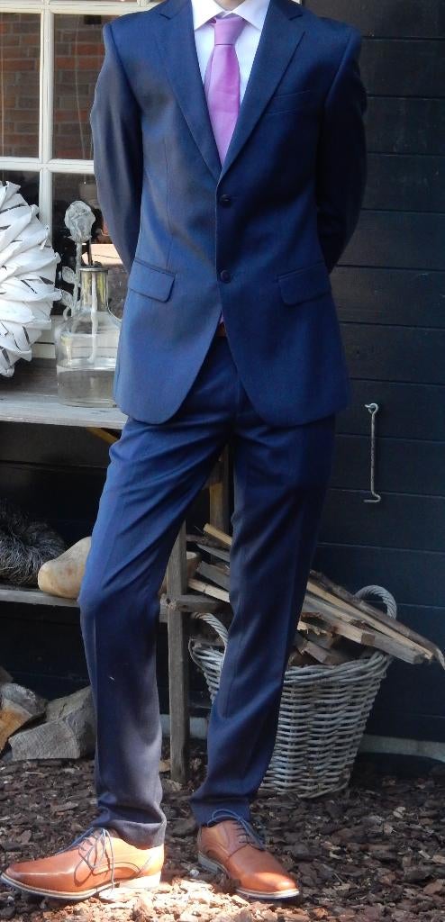 Donkerblauw pak. 1x Gedragen op een gala. Nieuw, Blauw, LIV Collection, Ophalen of Verzenden, Zo goed als nieuw