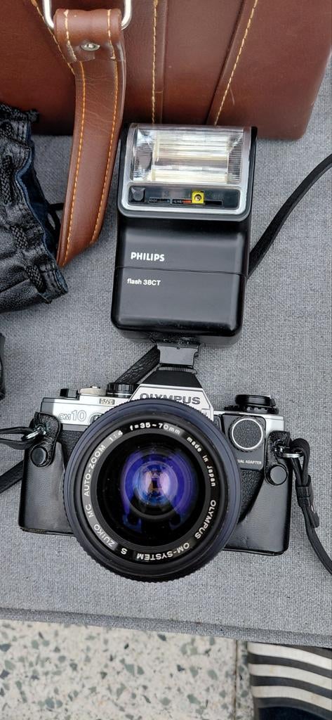 Olympus OM10 Spiegelreflexcamera met Philips flitser en tas, Audio, Tv en Foto, Fotocamera's Analoog, Ophalen of Verzenden, Gebruikt