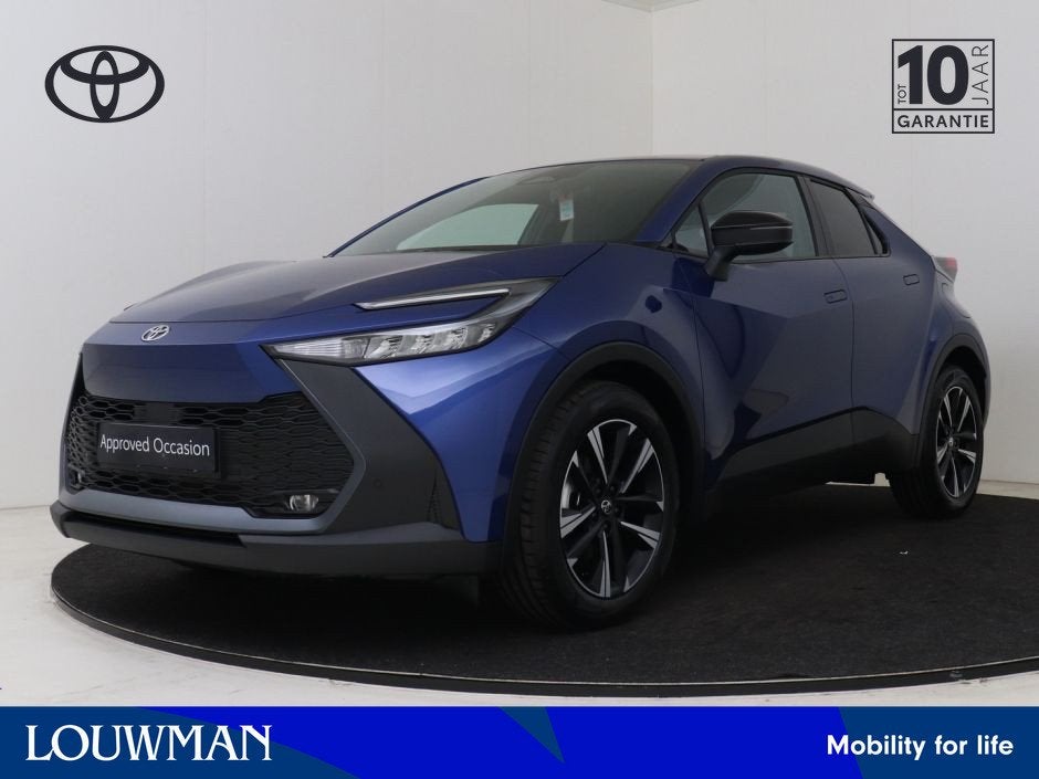 Toyota C-HR 1.8 Hybrid 140 Dynamic | NIEUW & SNEL LEVERBAAR, Auto's, Toyota, 12 maanden, Stof, 4 cilinders, Blauw
