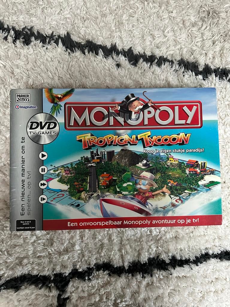 Monopoly Tropical Tycoon Compleet - DVD TV Games, Drie of vier spelers, Ophalen of Verzenden, Gebruikt