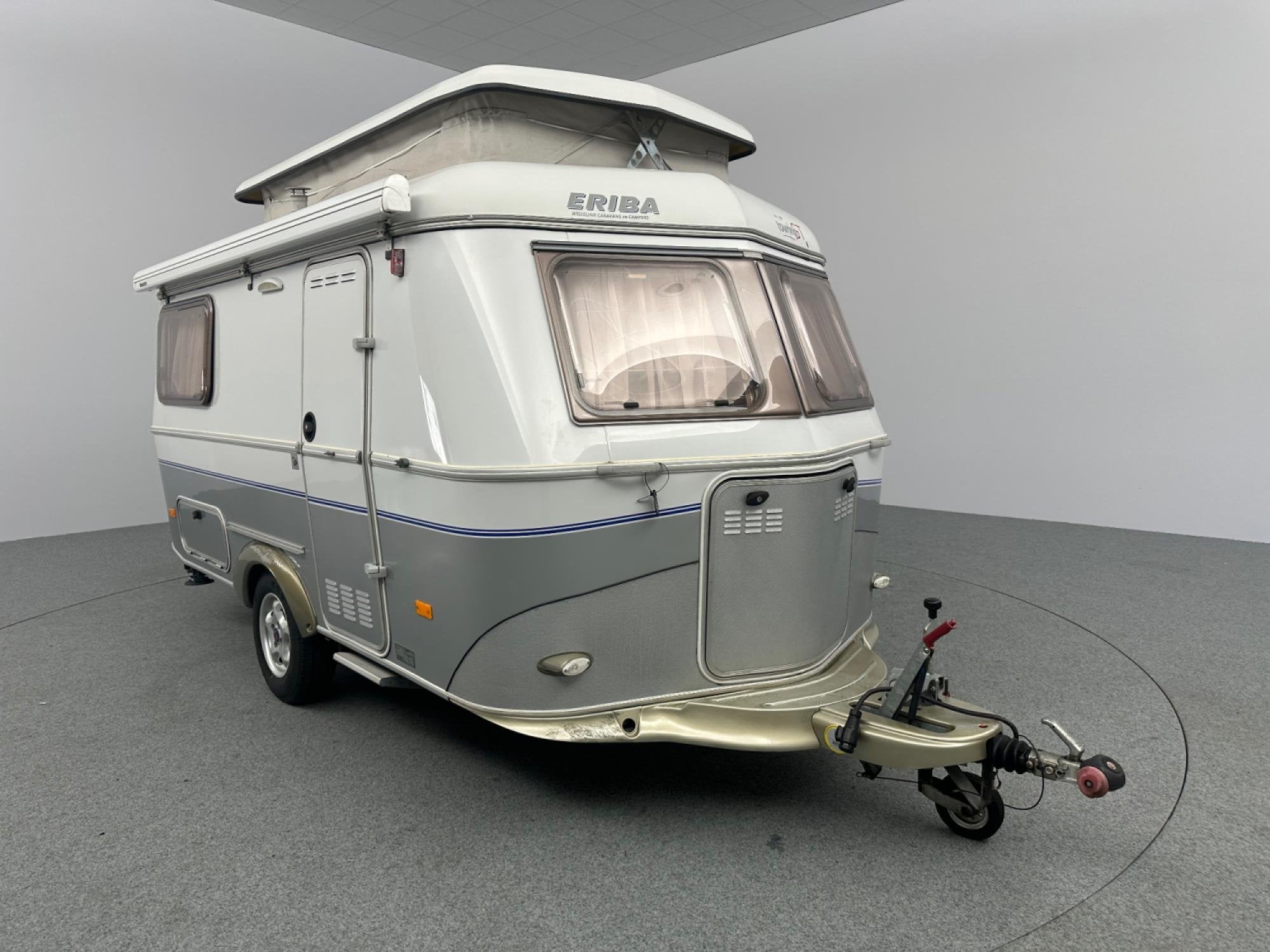 Eriba Touring Triton 410 Cassetteluifel Fietsendrager, Caravans en Kamperen, Caravans, Serviceluik, Vast bed, Bedrijf, 4 tot 5 meter