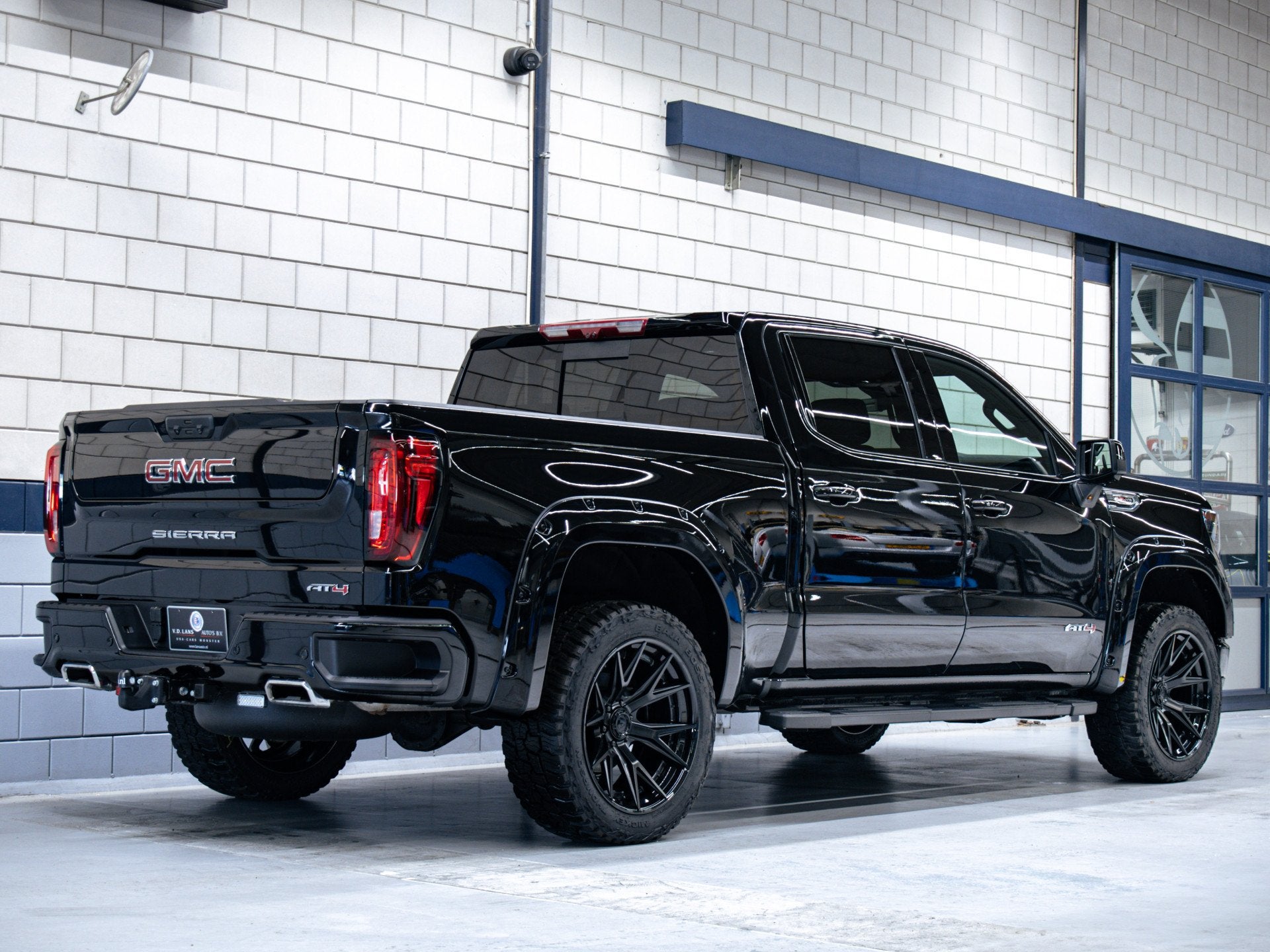 GMC Sierra 1500 AT4 6.2L V8 | Custom (bj 2024, automaat), Auto's, Automaat, Zwart, Zwart, Leder