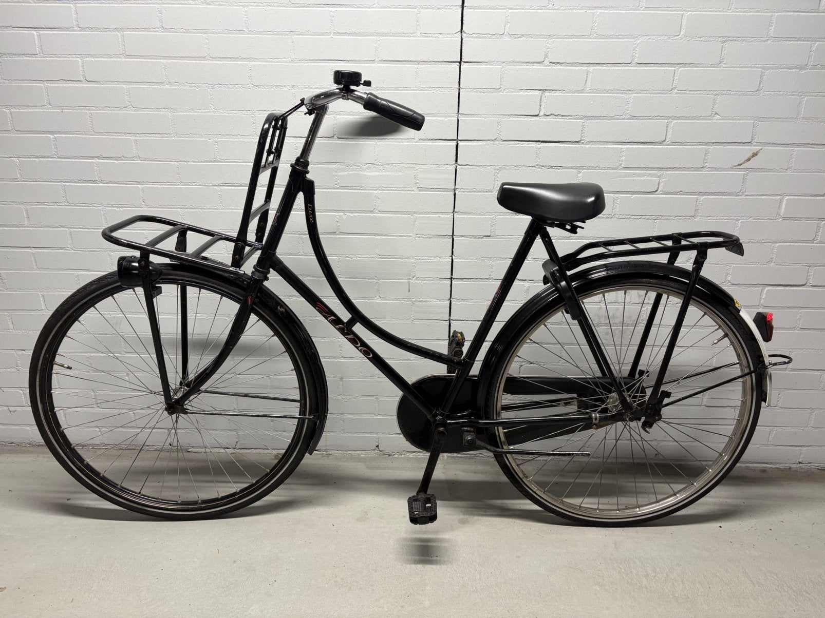 Zwarte Omafiets 28inch, Fietsen en Brommers, Fietsen | Dames | Omafietsen, 50 tot 53 cm, Ophalen, Gebruikt, Terugtraprem