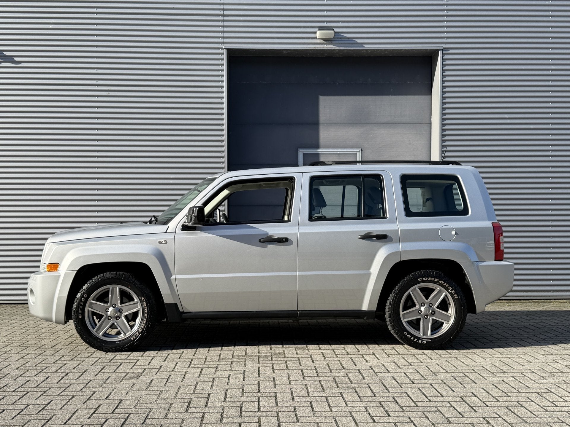 Jeep Patriot 2.4 Sport Adventure I 4x4 I Airco I Nl Auto, Auto's, Gebruikt, Zwart, 4 cilinders, Patriot
