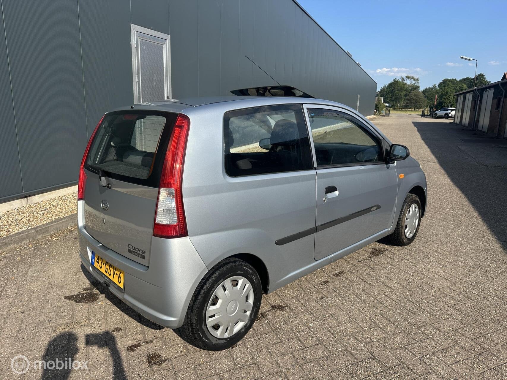 Daihatsu Cuore 1.0-12V 100th Ann. Dakraam Nieuwe APK✅, Auto's, Daihatsu, Voorwielaandrijving, Stof, 18 €/maand, Met garantie (alle)