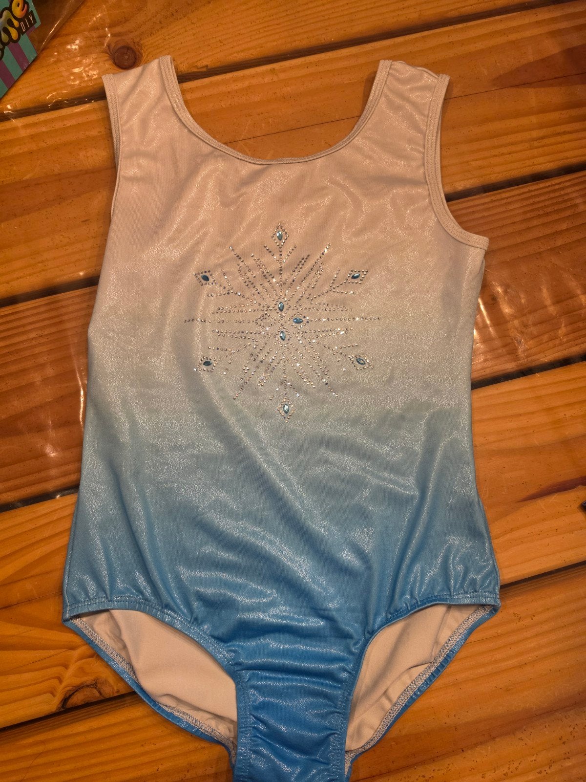 Blauw en wit turnpakje maat 152 met glitter, Ophalen of Verzenden, Gebruikt, Meisje, Sport- of Zwemkleding