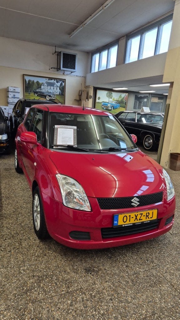 Suzuki Swift 1.5 5D 2007 Rood, Auto's, Suzuki, Voorwielaandrijving, 15 km/l, 40 €/maand, 4 cilinders