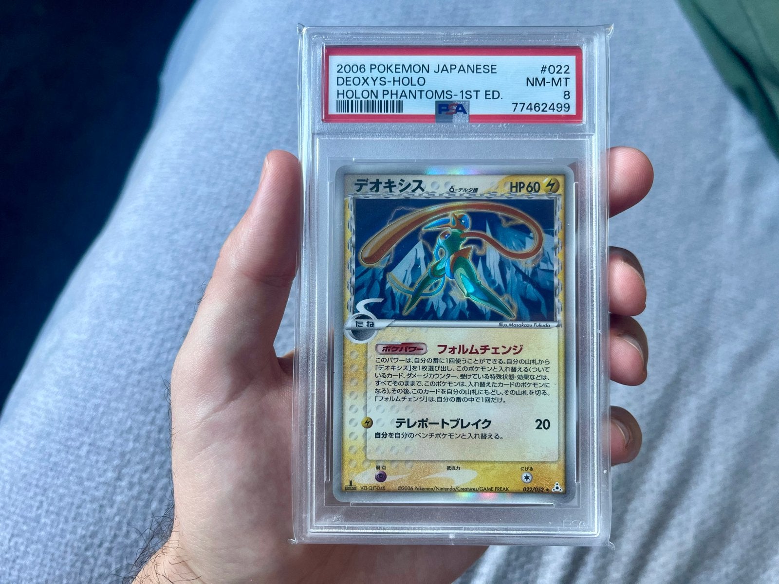 Pokemon Deoxys delta species | Holon Phantoms 1st ed [PSA 8], Ophalen of Verzenden, Zo goed als nieuw, Losse kaart, Foil
