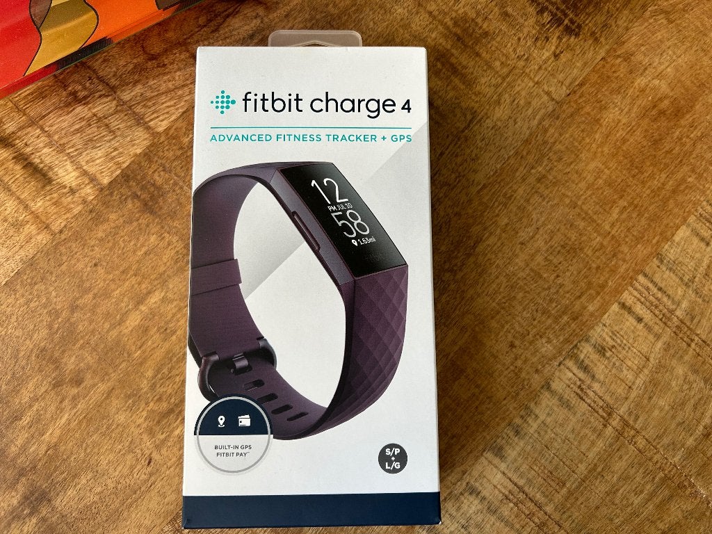 Fitbit Charge 4 Advanced Fitness Tracker + GPS - Paars, Paars, Ophalen of Verzenden, Zo goed als nieuw, Fitbit