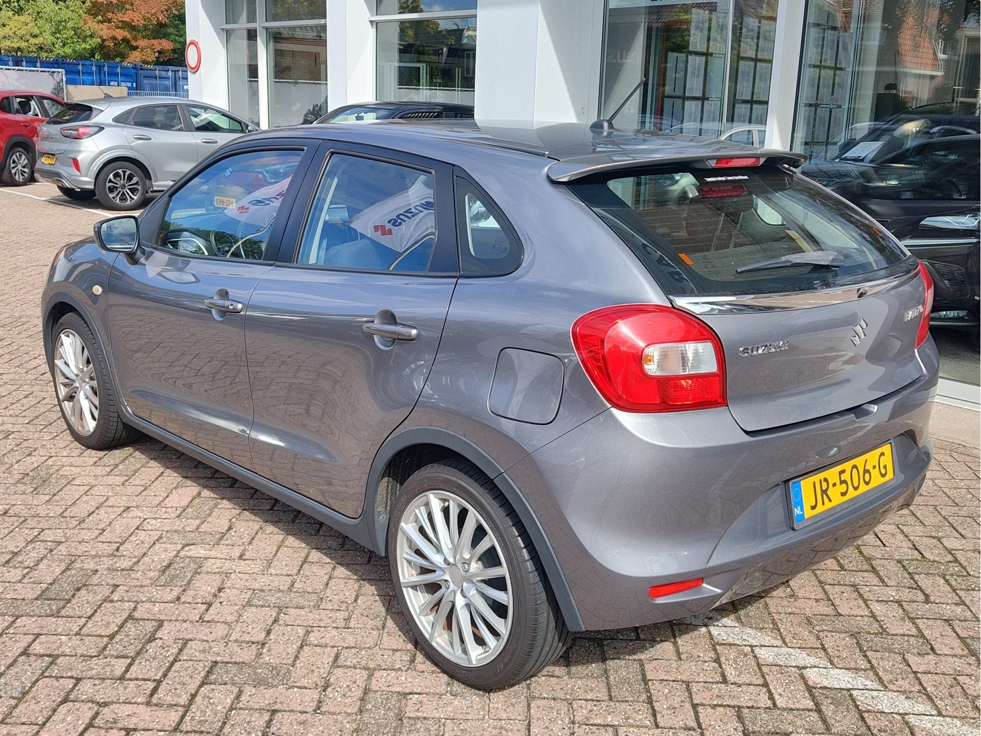 Suzuki Baleno 1.2 DYNAMIC Navi | Cruise | Parkeercamera, Auto's, Voorwielaandrijving, 12 maanden, Stof, Gebruikt