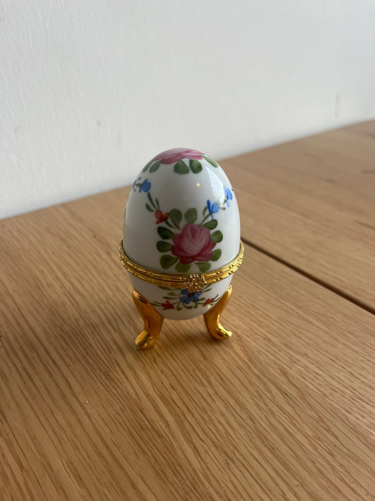 Porselein ei, Ophalen