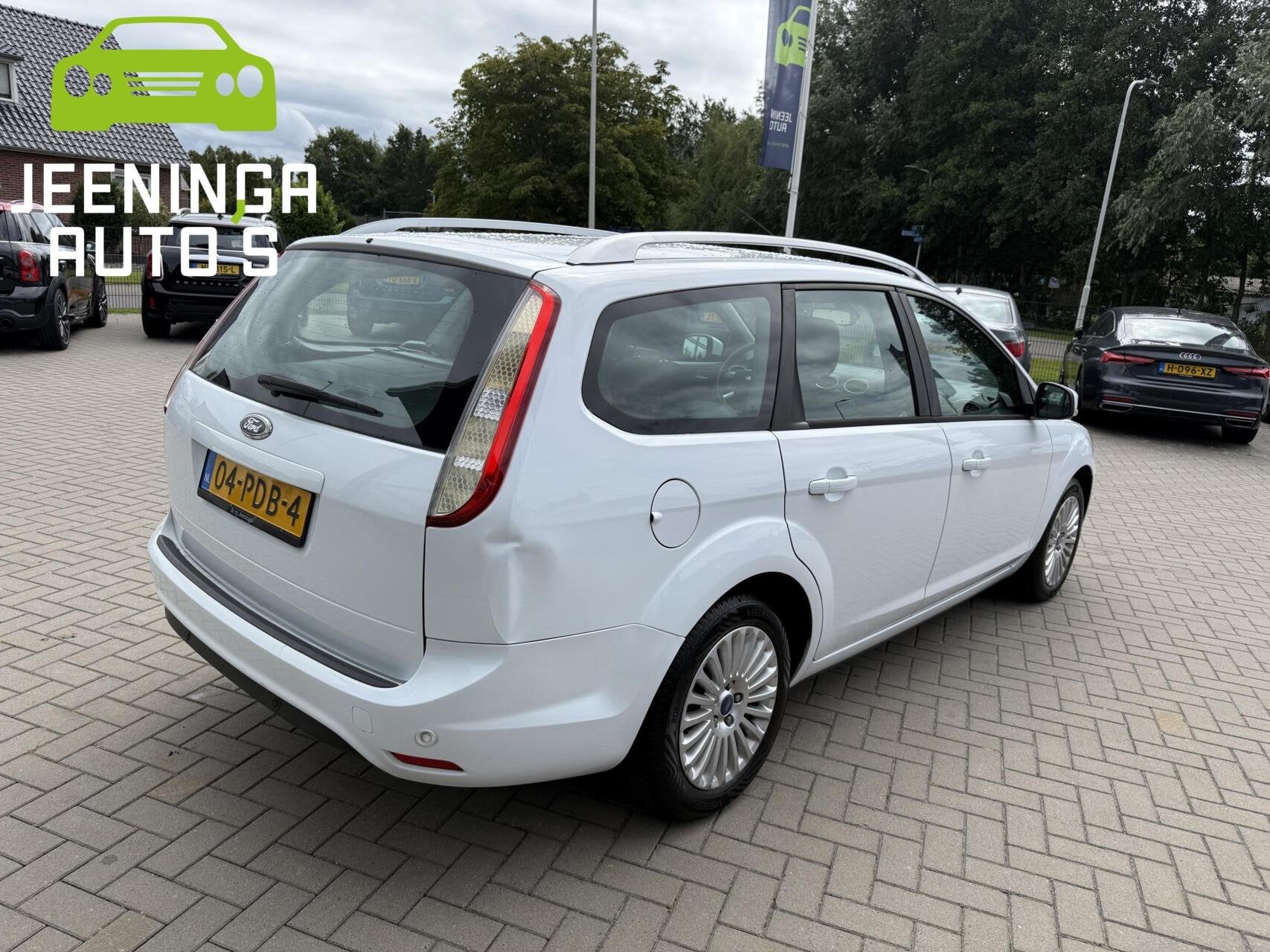 Ford Focus Wagon 1.6 TDCi Limited, Auto's, Ford, Euro 5, Stof, Gebruikt, Zwart